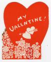 A pop-up card. Two red hearts serve as a background. A scene in the foreground shows a boat and ...