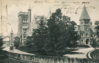 Black and white photograph of a huge Romanesque Revival style public building.