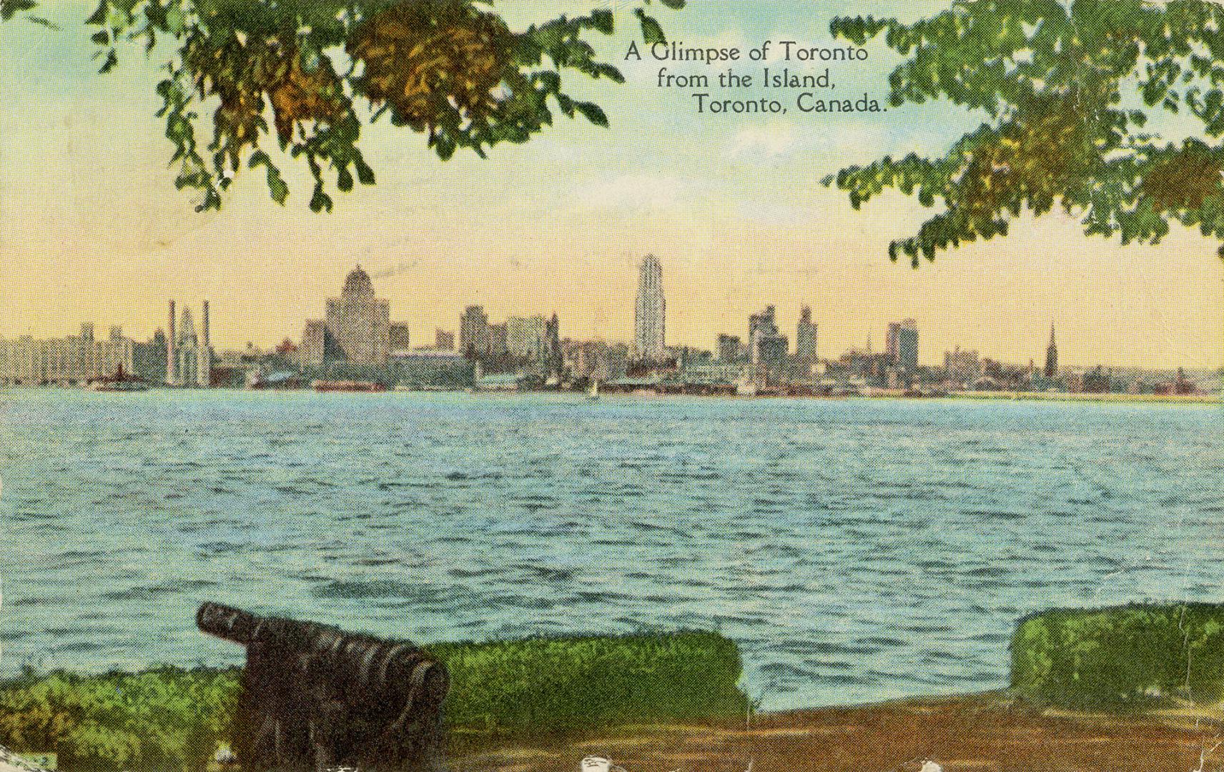 Colorized photograph of a shoreline with a large city in sight across a body of water.