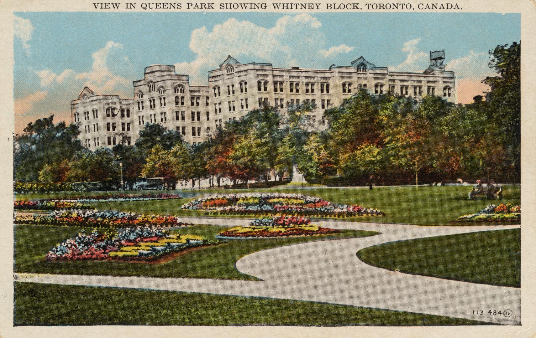 Colorized photograph of a large modern gothic-art building with a manicured park in front of it ...