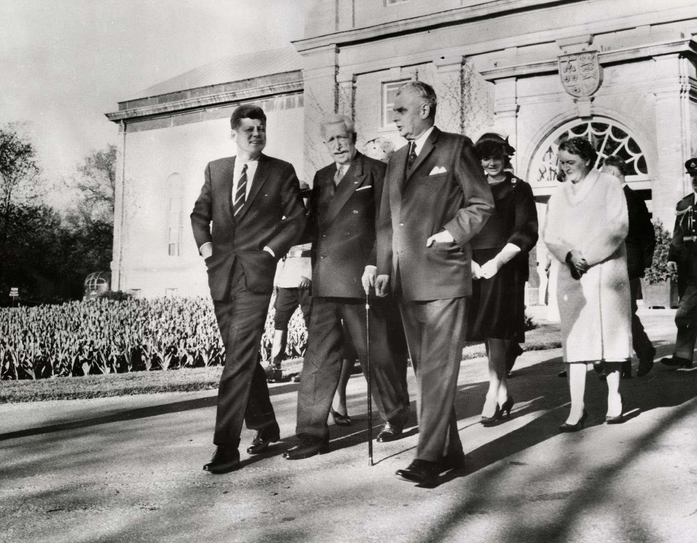 John F. Kennedy, Georges Vanier and John Diefenbaker followed by Jackie Kennedy and Olive Diefe ...