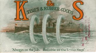 Image of a British Navy ship on the water, encircled by three white rubber tires. 