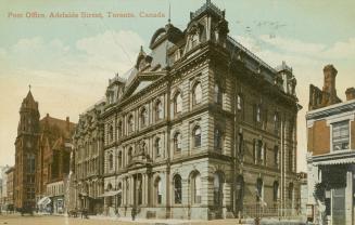 Colorized photograph of a four story public building in the Second Empire design.