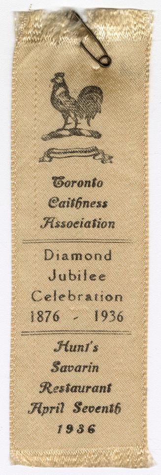A ribbon stating "Toronto Caithness Association Diamond Jubilee Celebration 1876-1936" with a s…