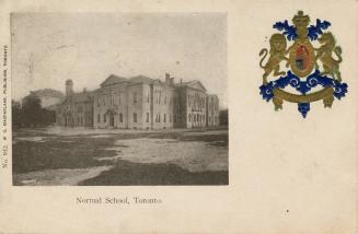 Black and white photograph of a large, three story, white stone, Victorian building with a cupo ...